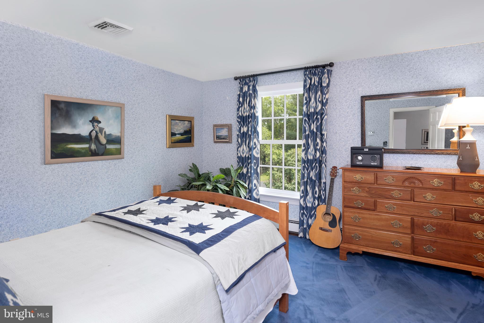 122 Bedens Brook Road Skillman, NJ 08558 - Photo 30 of 49 a bedroom with a bed and a large window