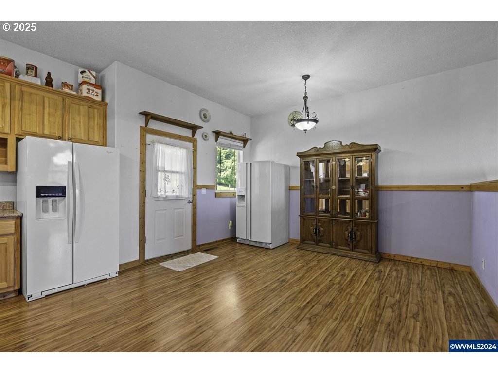 5465 Sams Place Southeast Turner, OR 97392 - Photo 11 of 46 a view of an empty room with a window