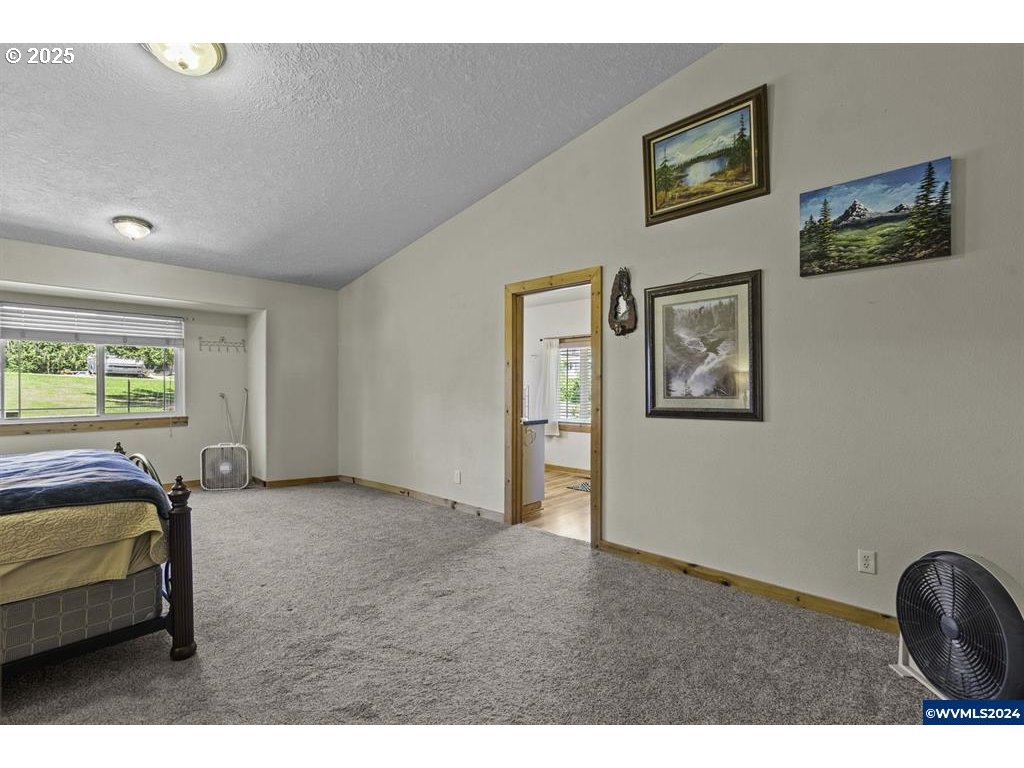 5465 Sams Place Southeast Turner, OR 97392 - Photo 21 of 46 a view of livingroom with furniture and window