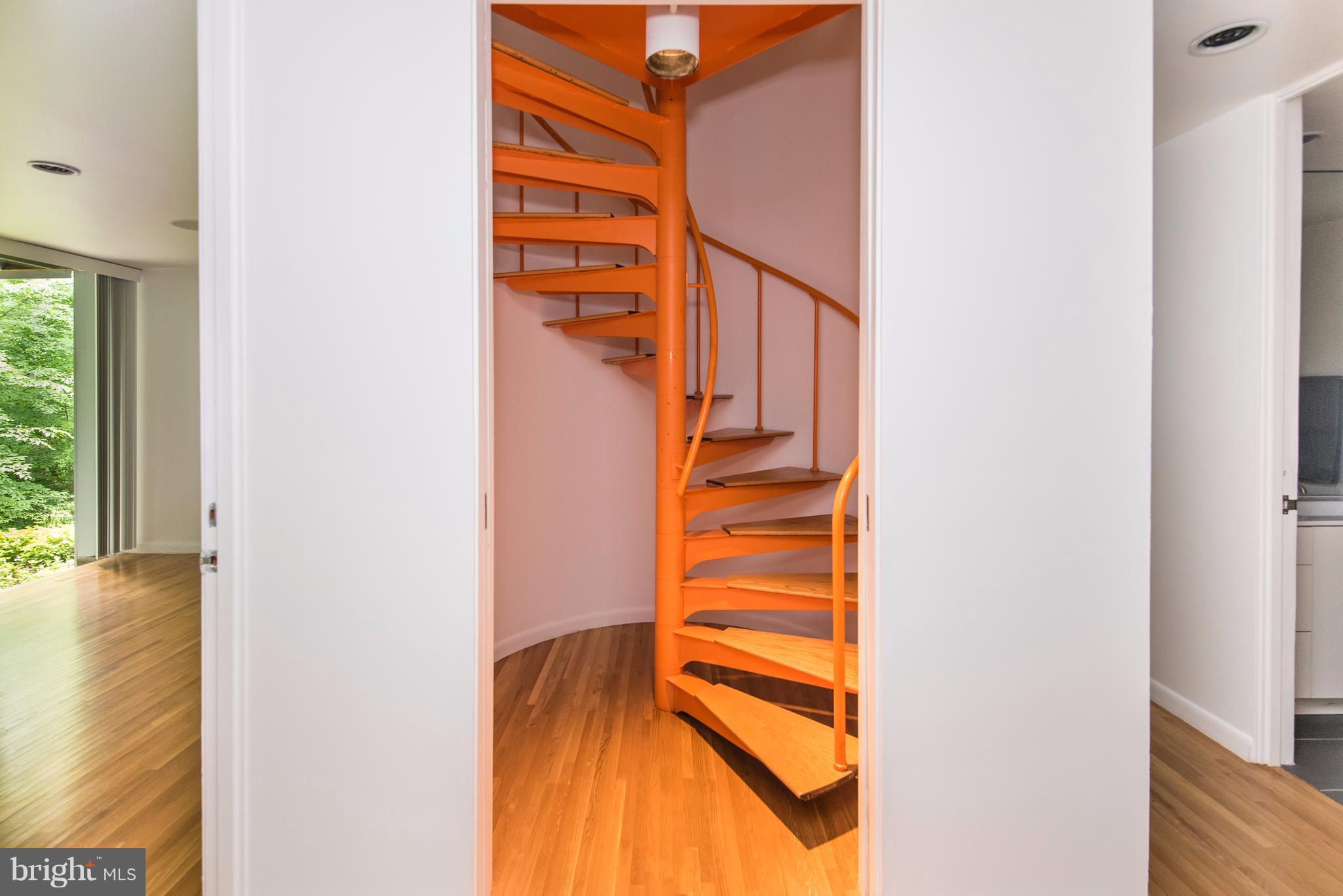 8630 Overlook Road McLean, VA 22102 - Photo 22 of 30 Spiral stairs to upper and lower level
