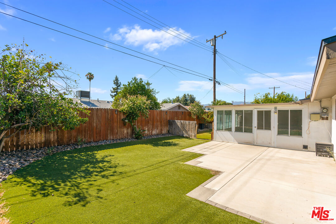 926 Barbra Lane Redlands, CA 92374 - Photo 17 of 23 a view of a house with a yard