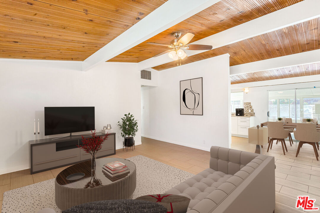 926 Barbra Lane Redlands, CA 92374 - Photo 2 of 23 a living room with furniture and a flat screen tv