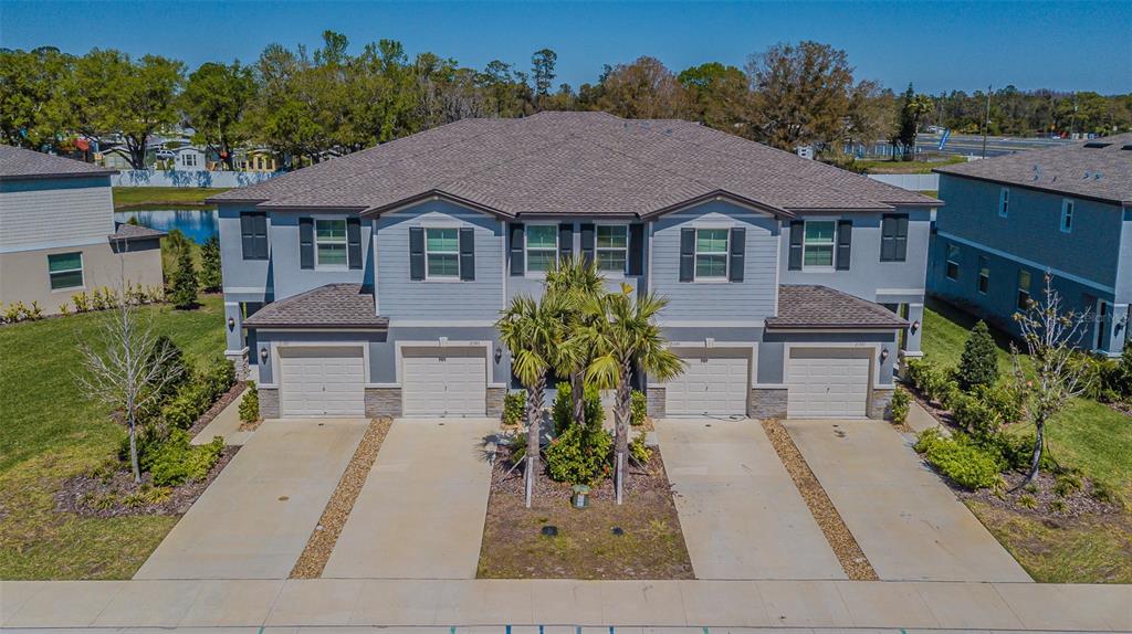 21385 Darter Road Land O' Lakes, FL 34638 - Photo 1 of 1 End-Unit, Pond View