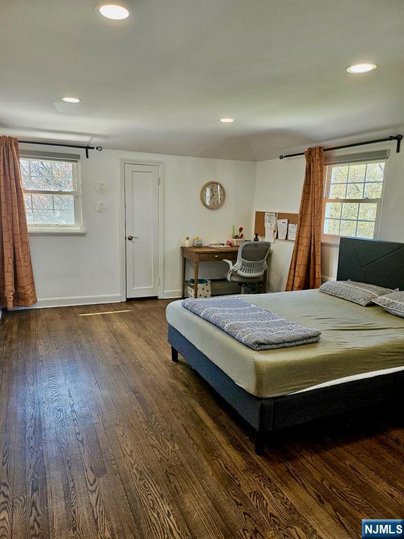 440 Bogert Road River Edge, NJ 07661 - Photo 22 of 25 a bedroom with a bed and wooden floor