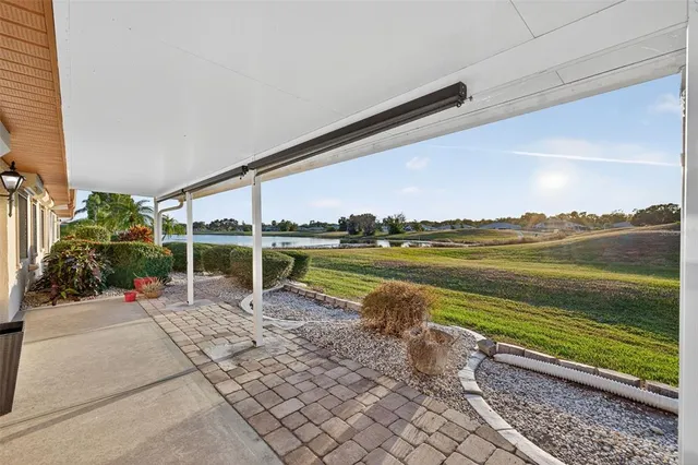 a view of a lake with a outdoor space