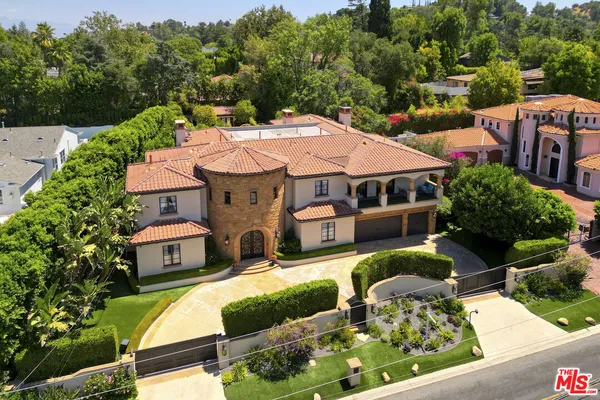a view of a house with a sink and garden