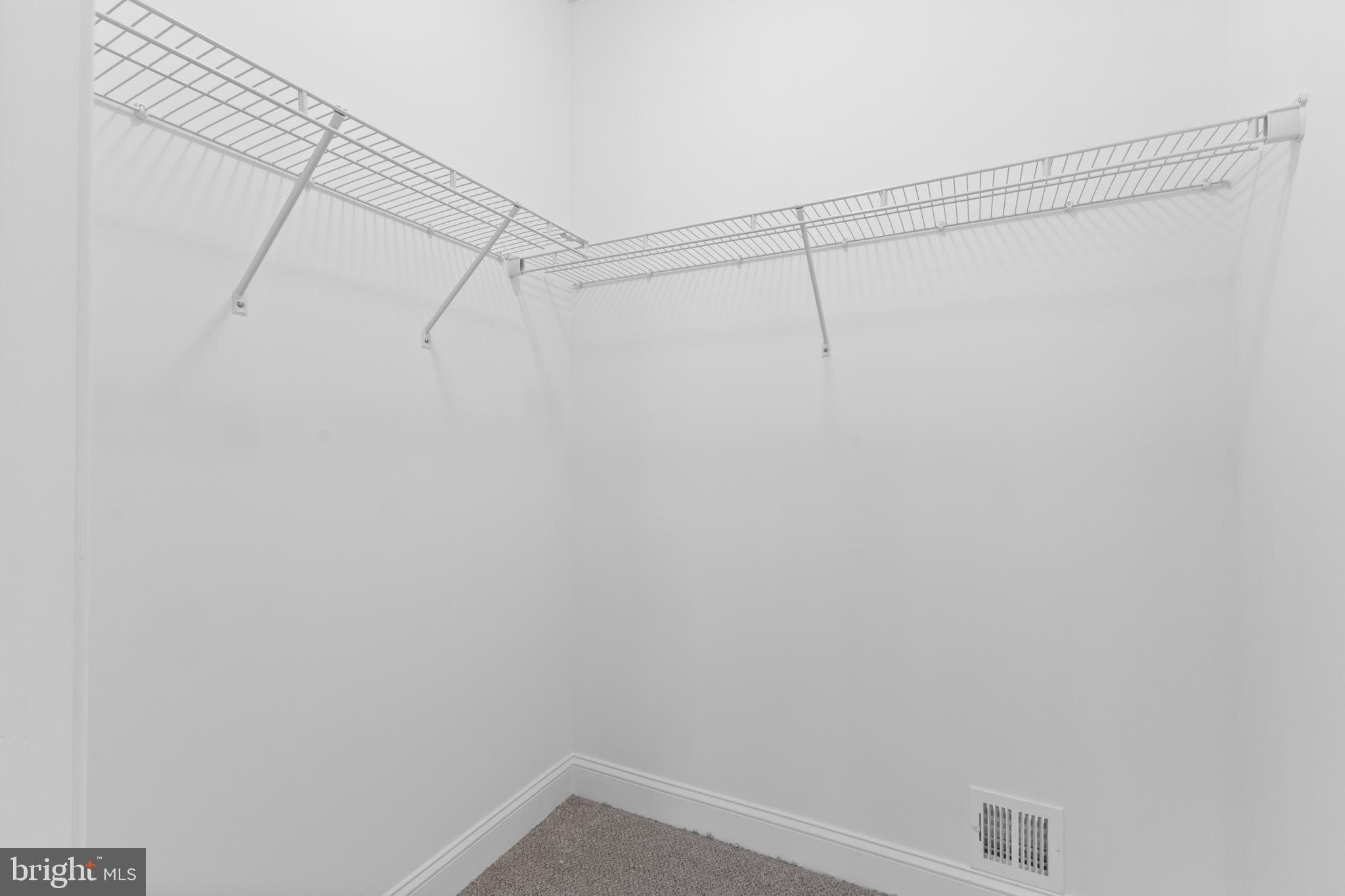 868 Veneto Court, Unit 66 Easton, PA 18040 - Photo 18 of 37 a view of a room with racks on the wall