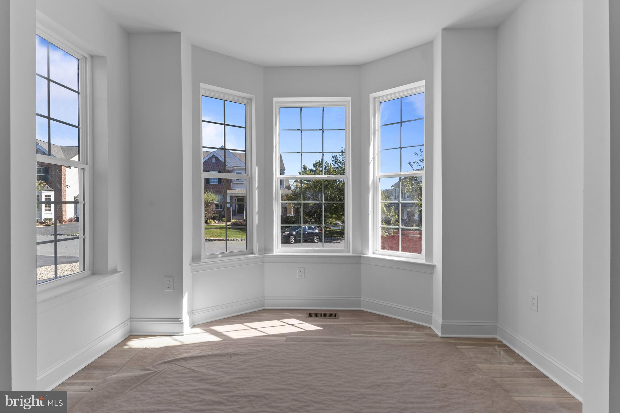 868 Veneto Court, Unit 66 Easton, PA 18040 - Photo 6 of 37 a view of an empty room with a window