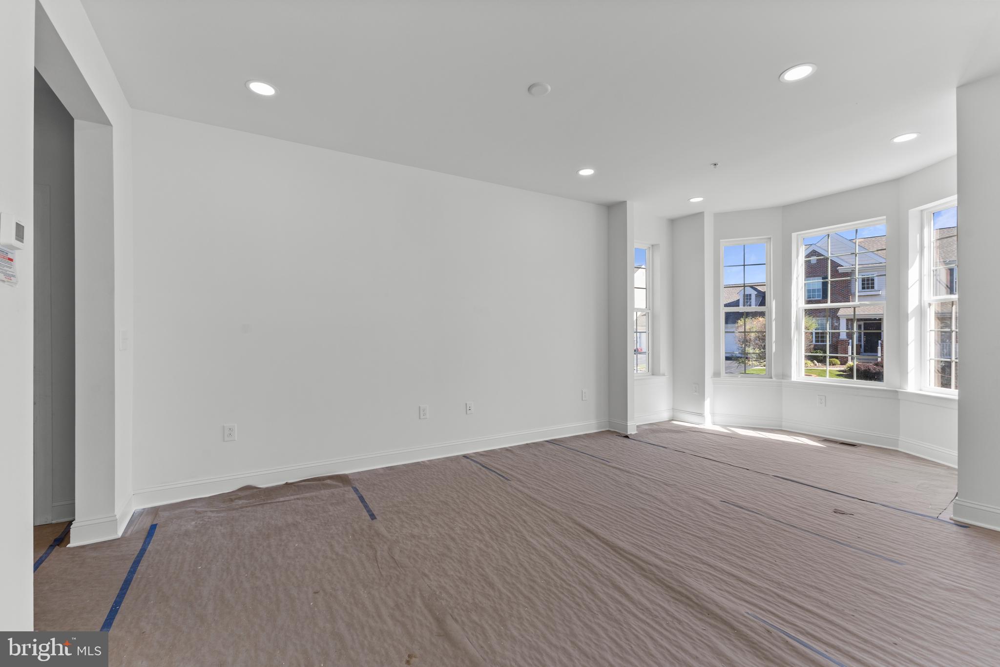 868 Veneto Court, Unit 66 Easton, PA 18040 - Photo 7 of 37 a view of an empty room with a window