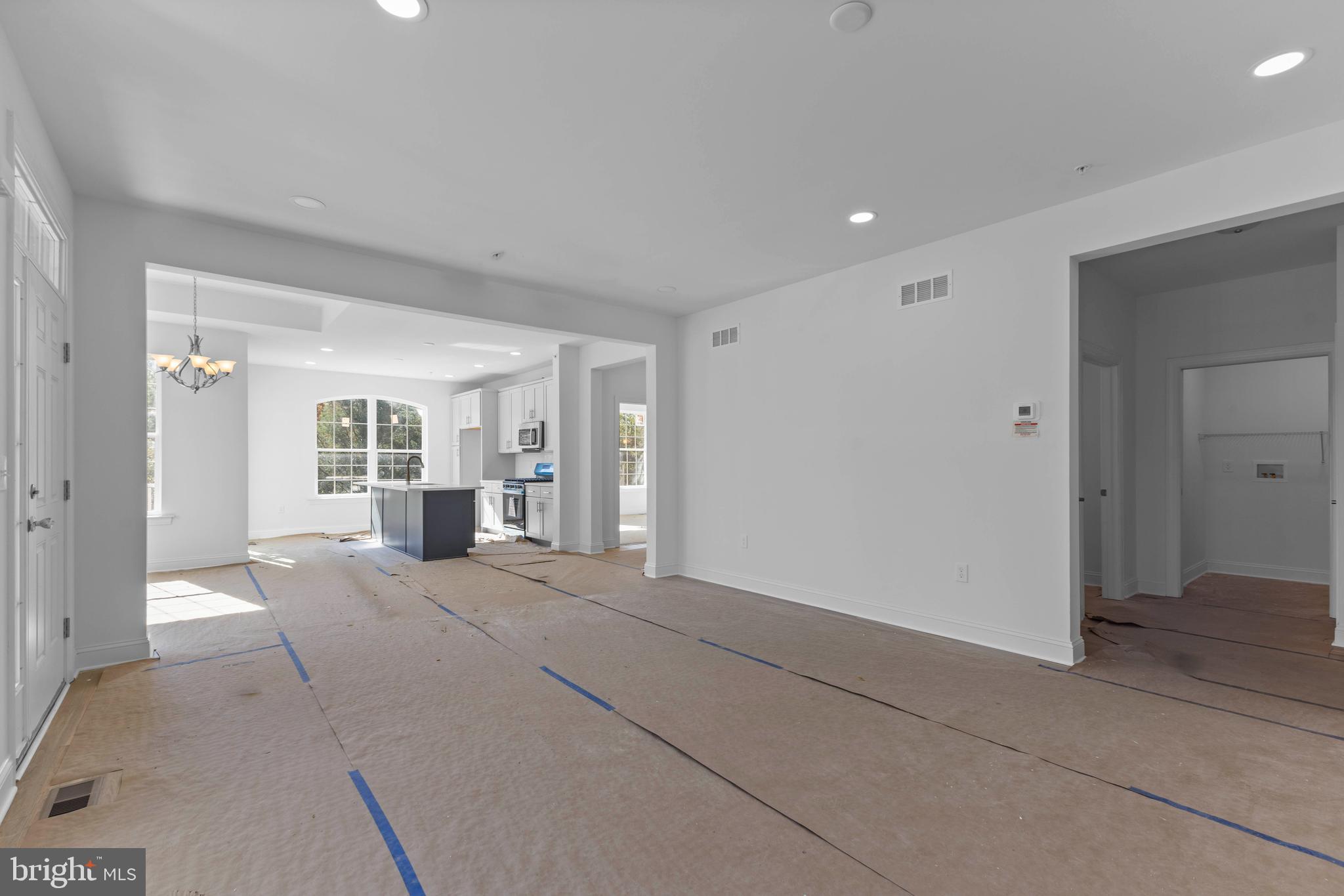 868 Veneto Court, Unit 66 Easton, PA 18040 - Photo 8 of 37 a view of an empty room with large window