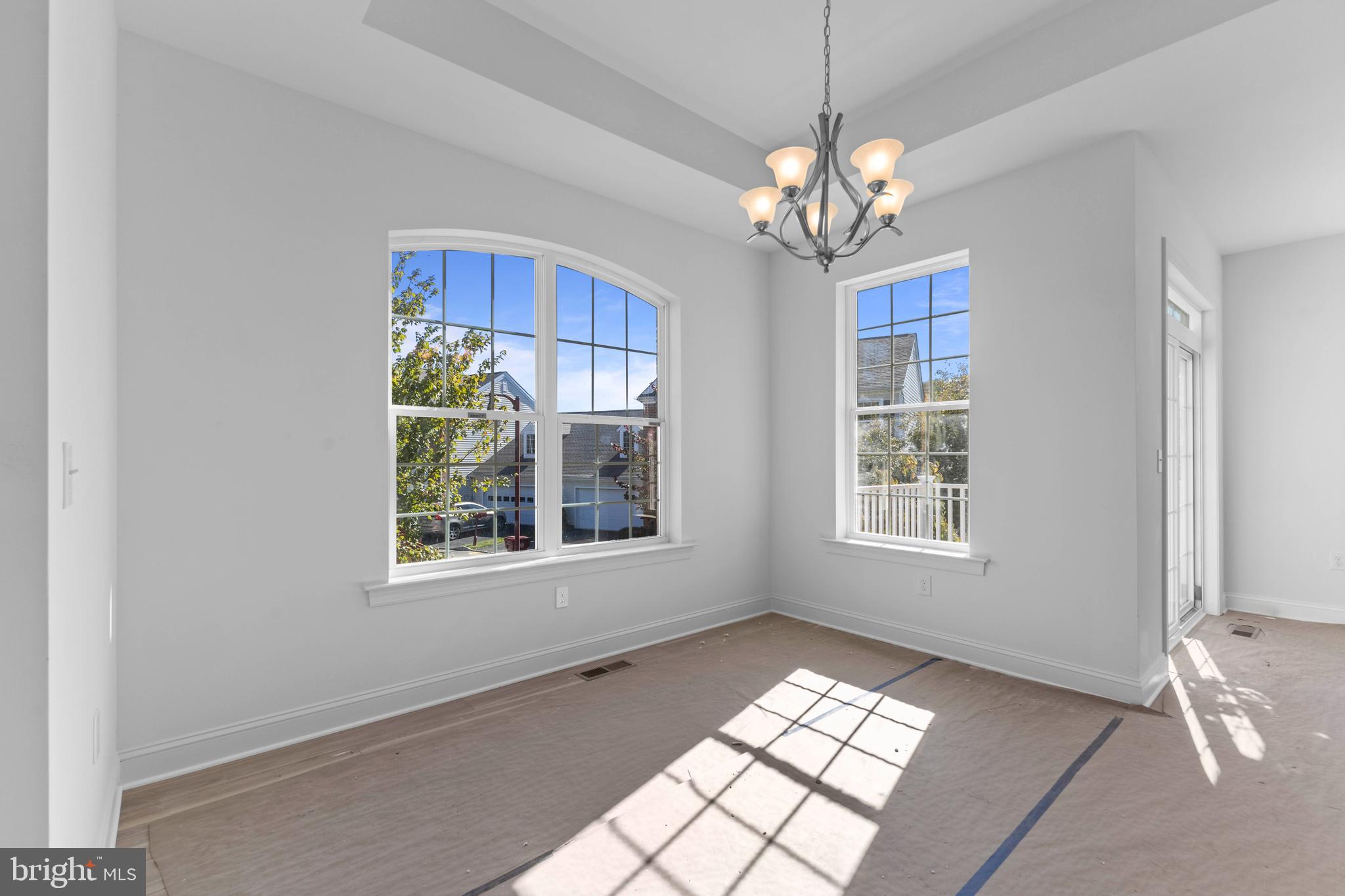 868 Veneto Court, Unit 66 Easton, PA 18040 - Photo 10 of 37 a view of a room with windows and chandelier