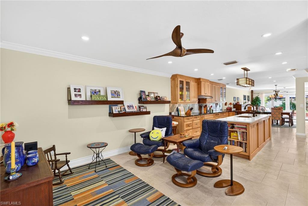 4030 Crayton Road, Unit C2 Naples, FL 34103 - Photo 14 of 32 a living room with furniture and kitchen view