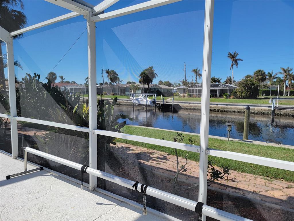1732 Boca Raton Court Punta Gorda, FL 33950 - Photo 60 of 64 a view of swimming pool with outdoor seating