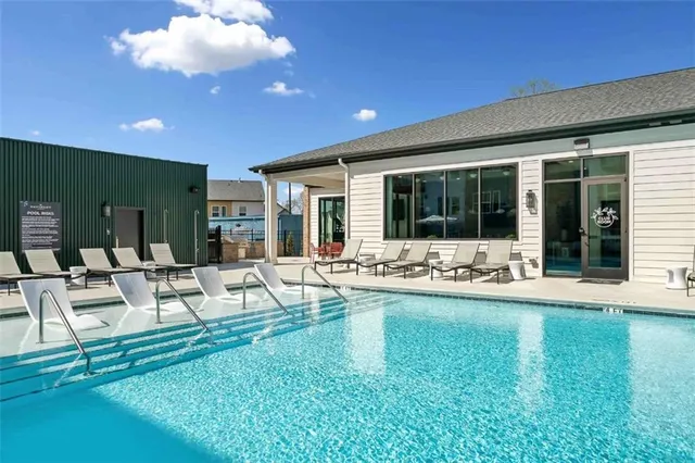 a view of a house with swimming pool