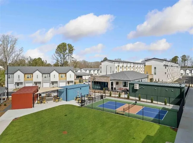 a view of a tables and chairs in patio
