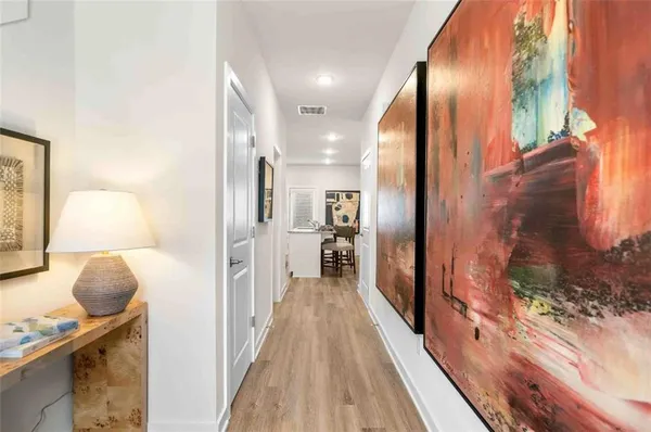 a view of a bathroom from the hallway