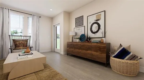 a living room with furniture and a window