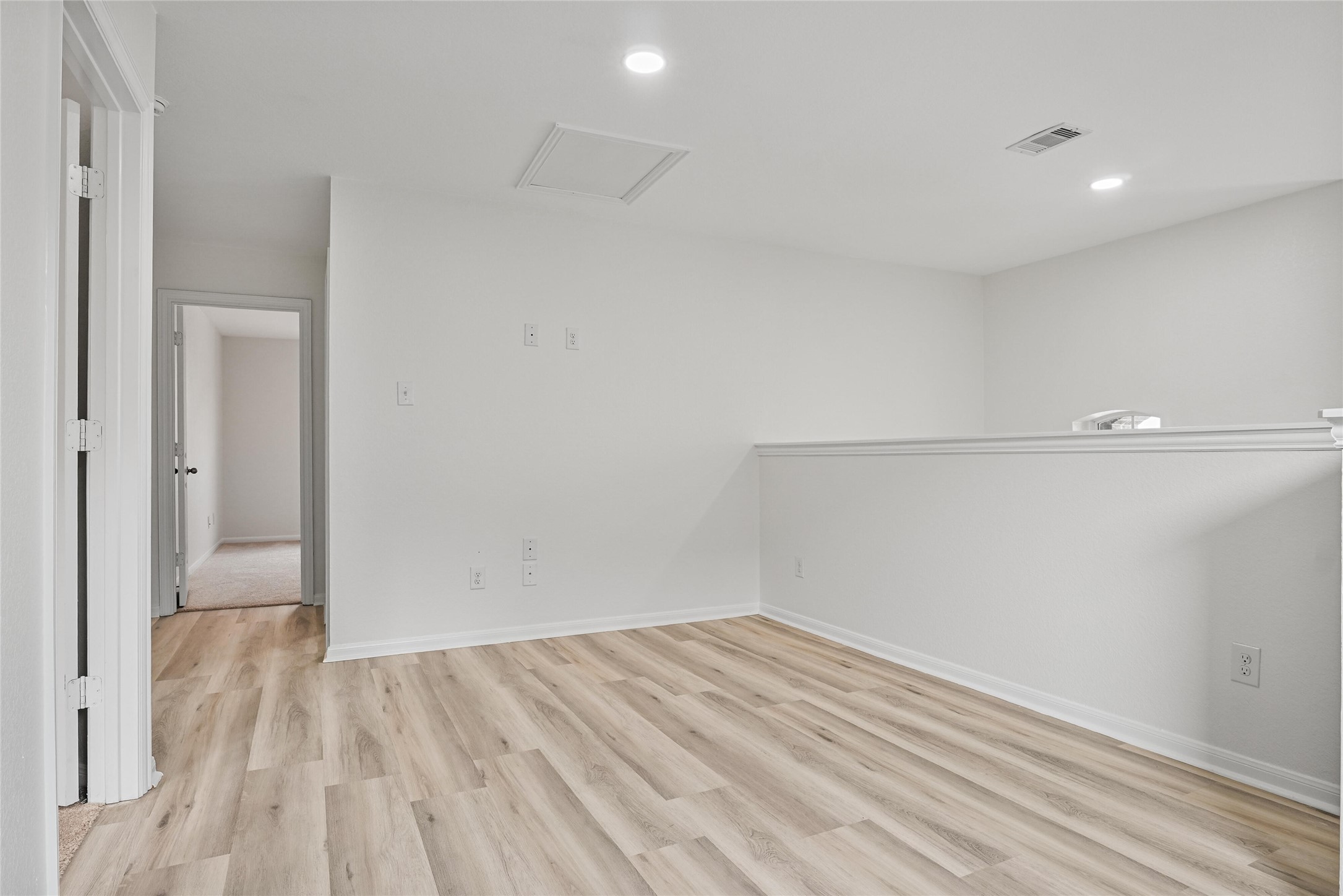 10511 Kings River Drive Rosharon, TX 77583 - Photo 21 of 25 a view of a room with wooden floor