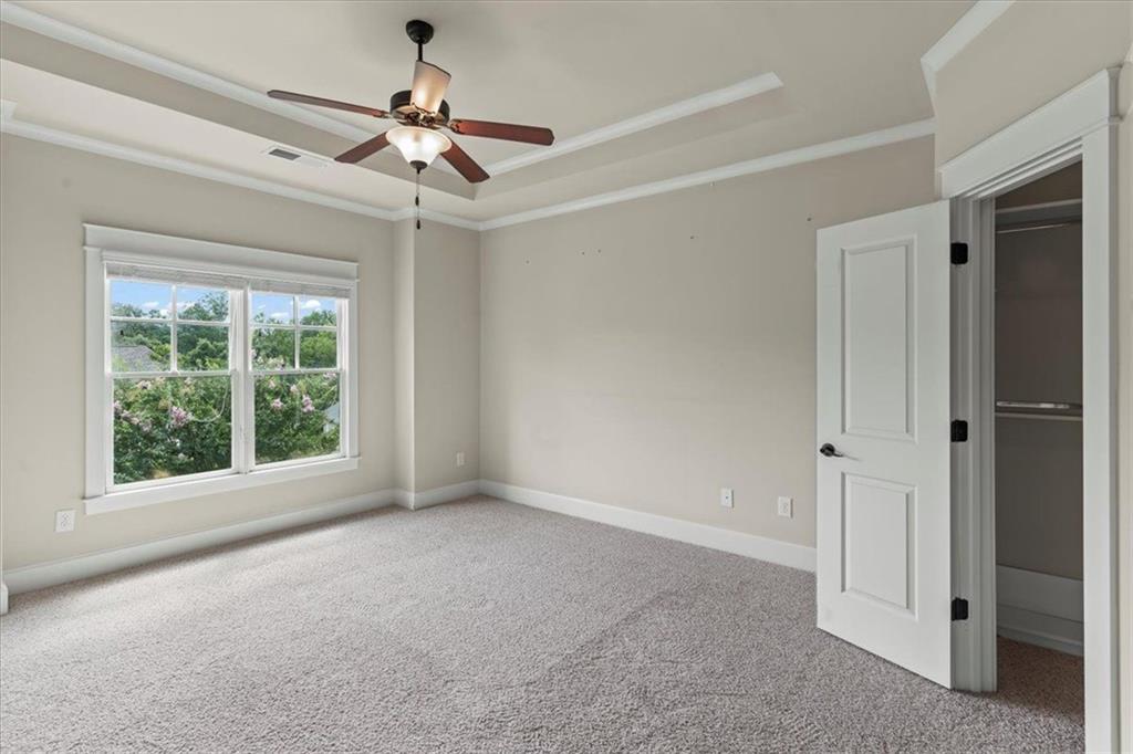 2996 Cambridge Hill Drive Dacula, GA 30019 - Photo 29 of 49 a view of an empty room with a window