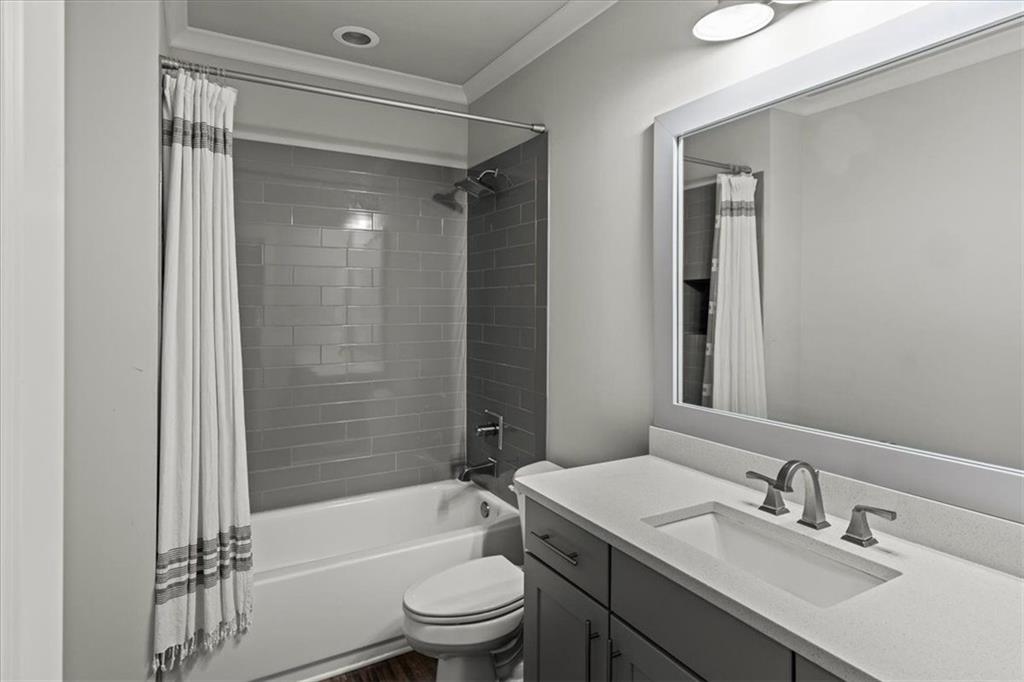 2996 Cambridge Hill Drive Dacula, GA 30019 - Photo 34 of 49 a bathroom with a sink toilet and shower