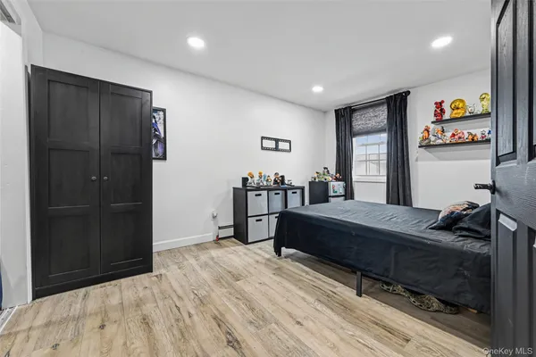 a bed room with a bed and furniture