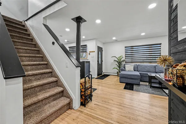 a outdoor space with lots of furniture and wooden floor