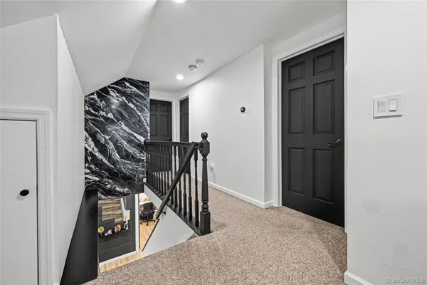 a view of entryway with stairs