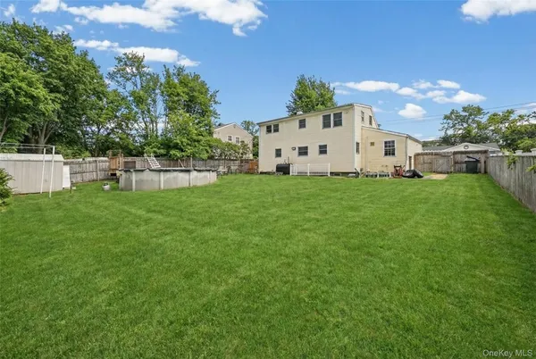 a house view with a garden space