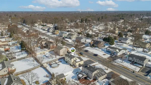 an aerial view of residential building with parking space