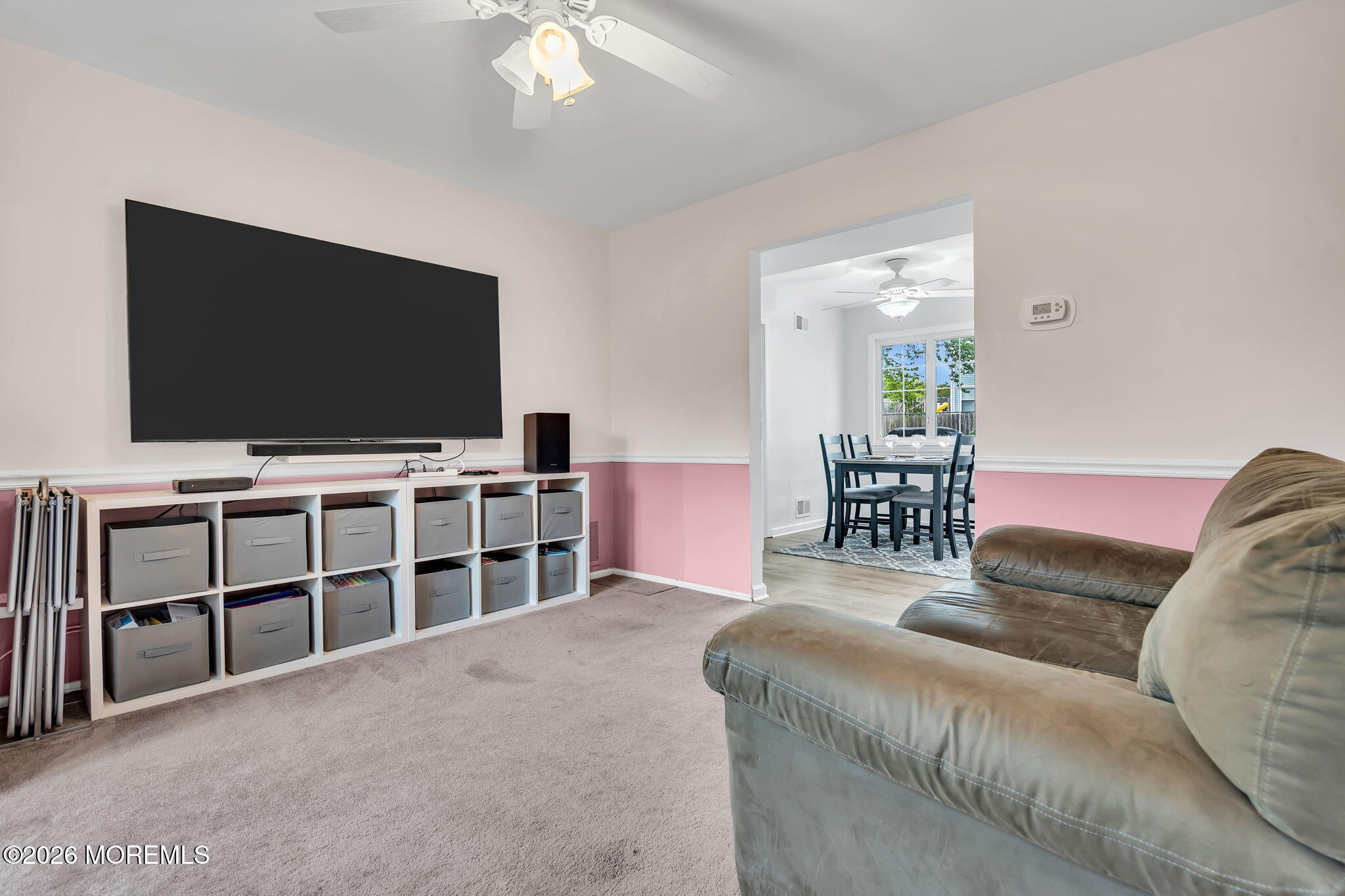 96 Yellowbank Road Toms River, NJ 08753 - Photo 34 of 45 a living room with furniture and a flat screen tv