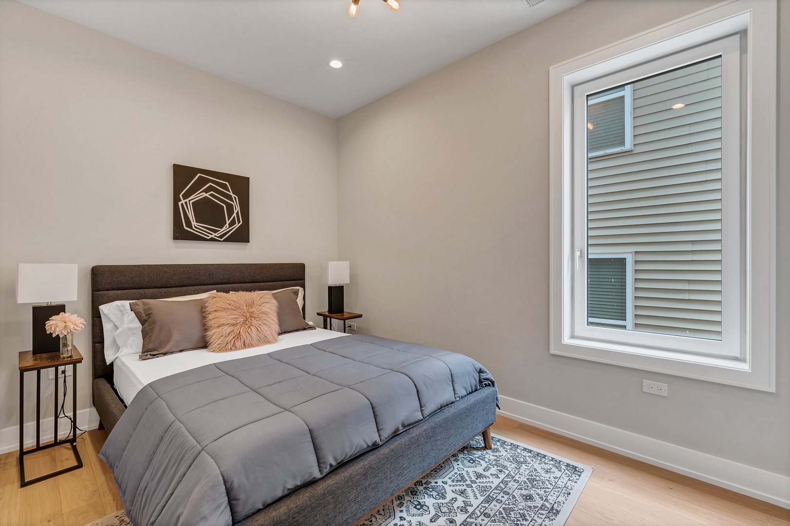 2341 West Adams Street, Unit 4W Chicago, IL 60612 - Photo 9 of 15 a bedroom with a bed and a window