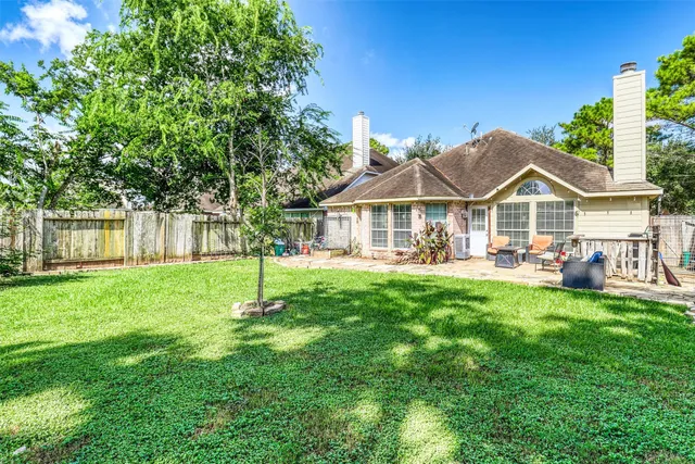 a view of a backyard with a garden