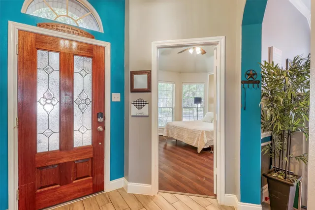 view of living room with a large window and wooden floor