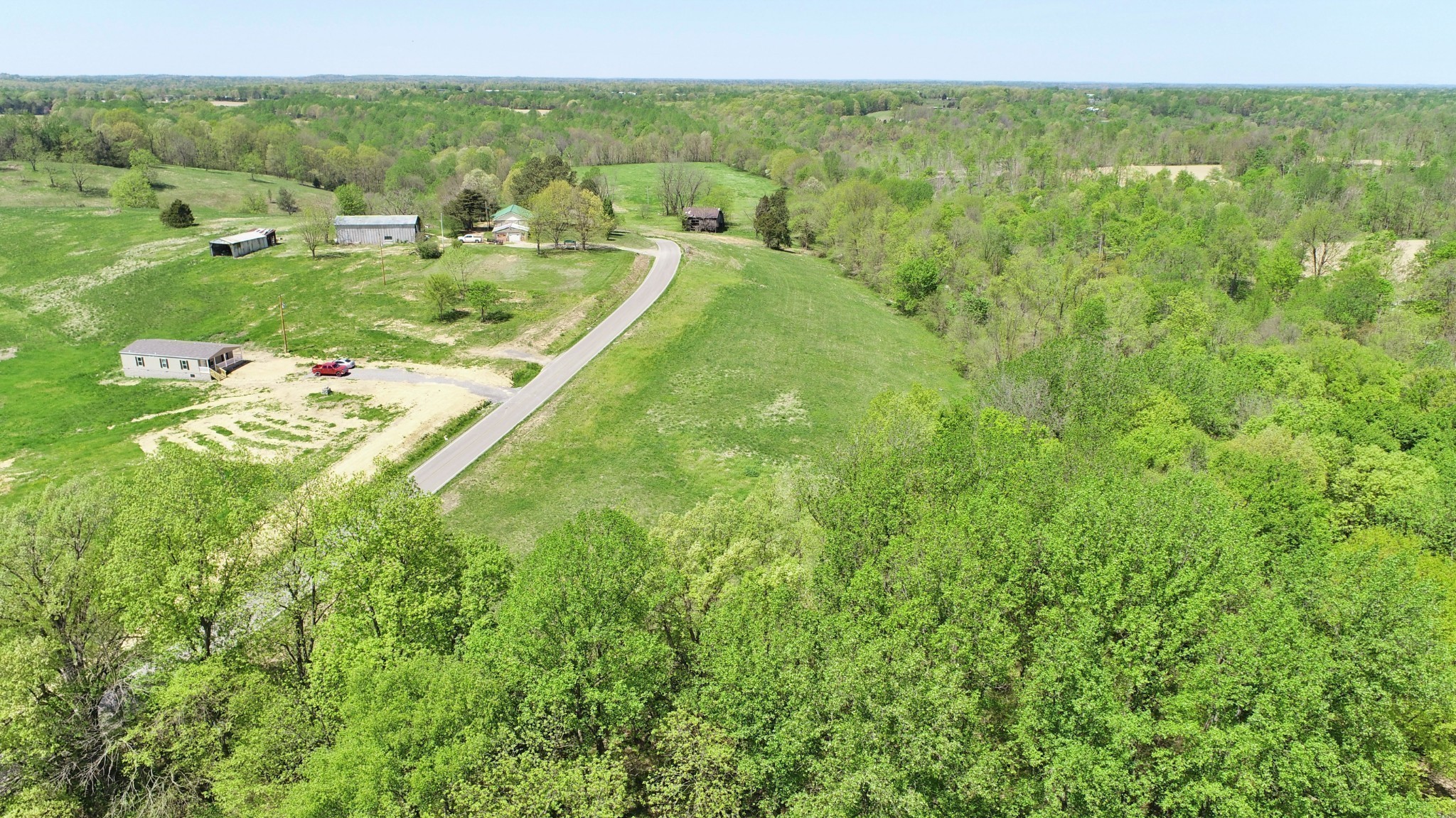 22 Wixtown Road Westmoreland, TN 37186 - Photo 7 of 7 a view of a city with lush green forest