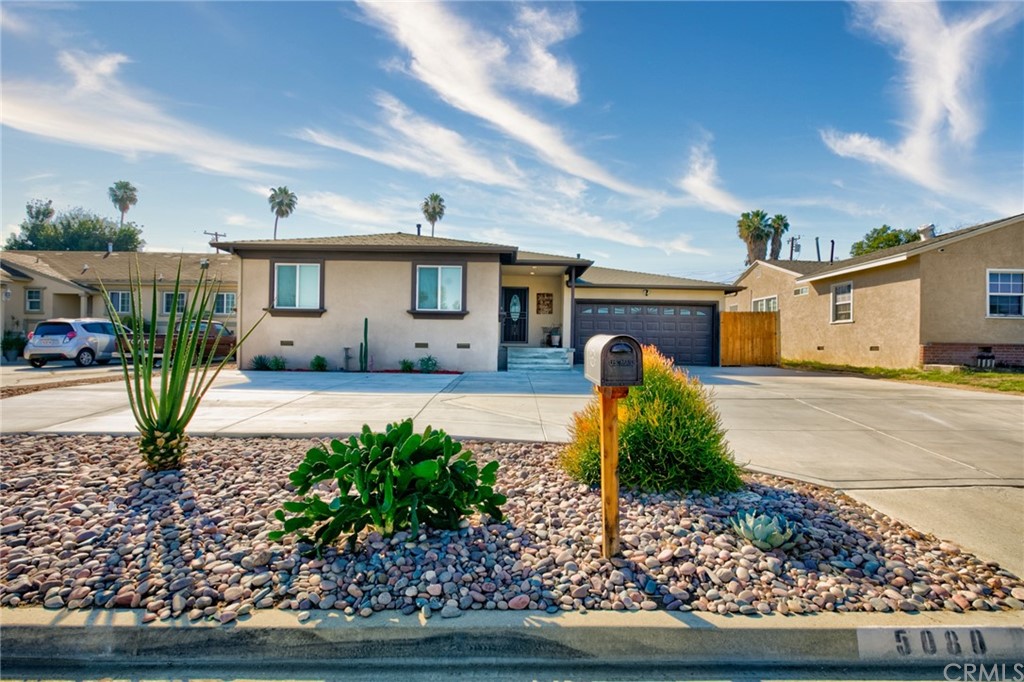 5080 Foothill Avenue Riverside, CA 92503 - Photo 1 of 1 a front view of a house with garden