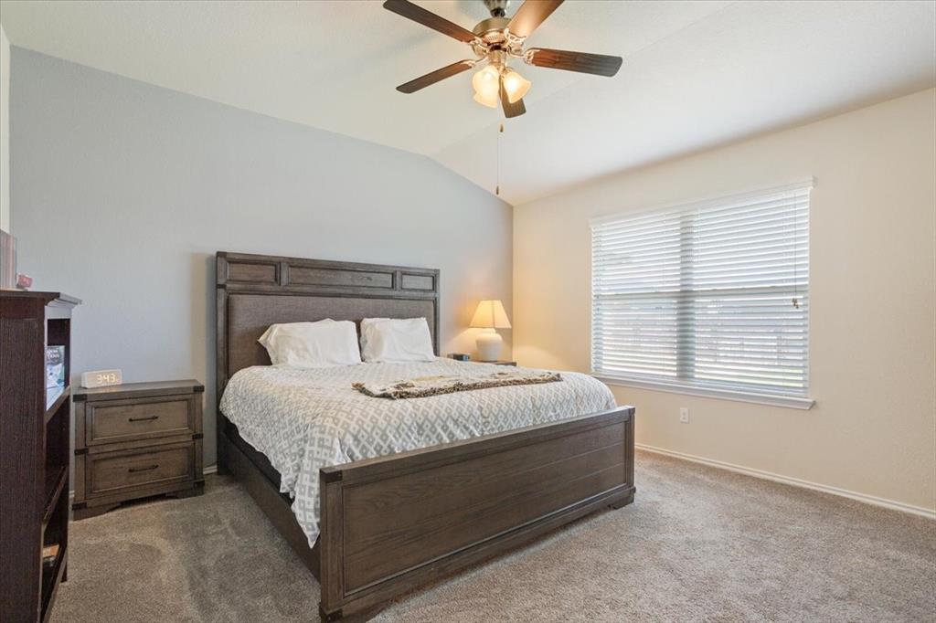 5308 Tama Drive Waco, TX 76708 - Photo 16 of 29 a bedroom with a bed and window