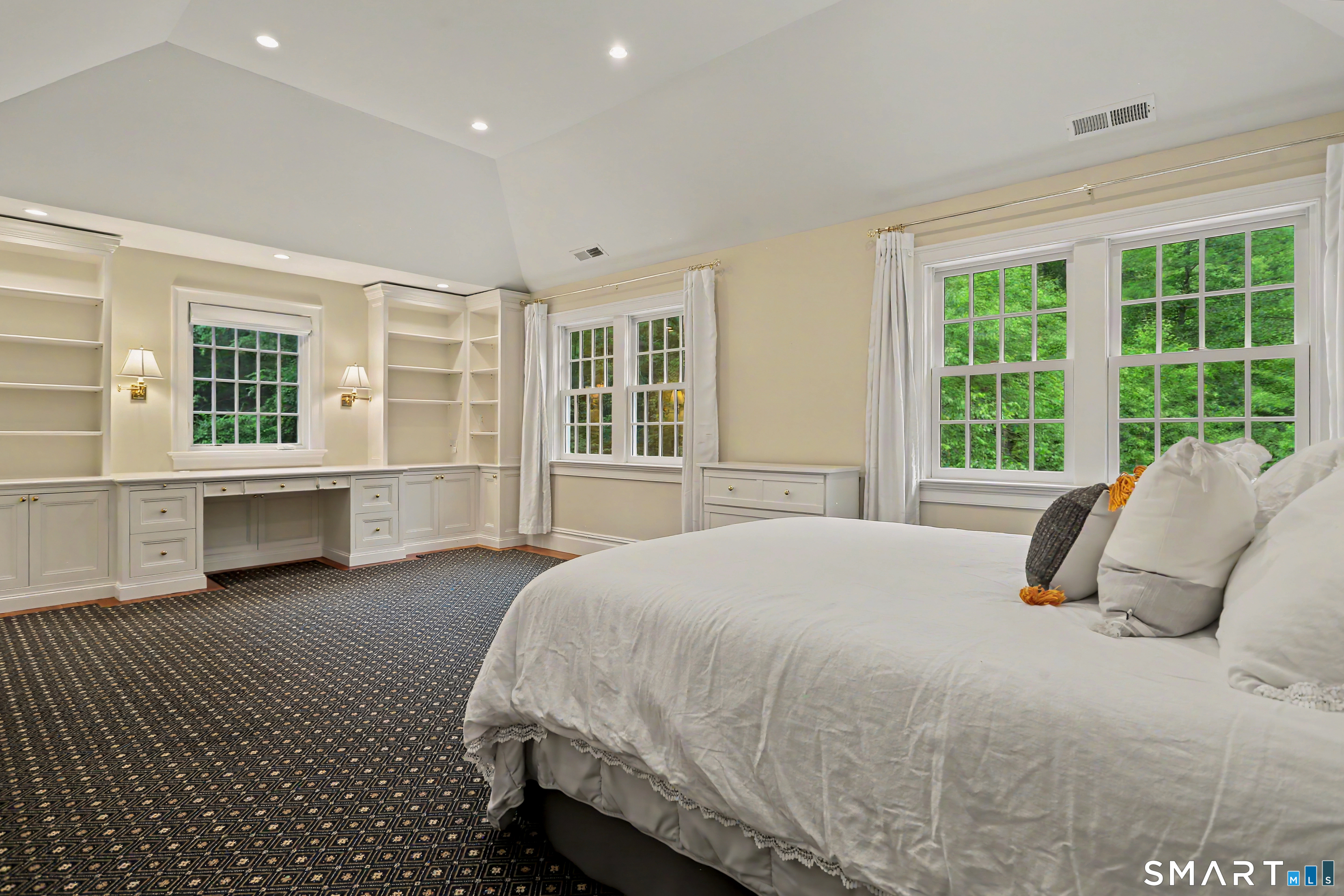 108 Logan Road New Canaan, CT 06840 - Photo 30 of 40 a bedroom with a large bed and a large window