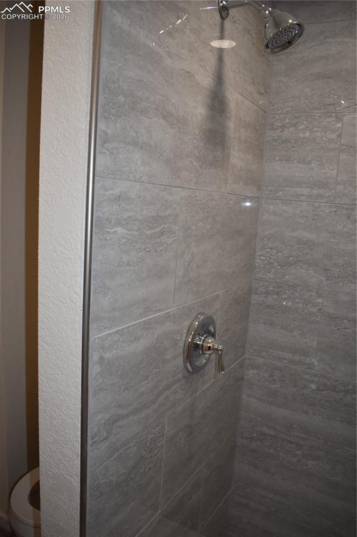 805 Raton Avenue La Junta, CO 81050 - Photo 15 of 26 a bathroom with a shower