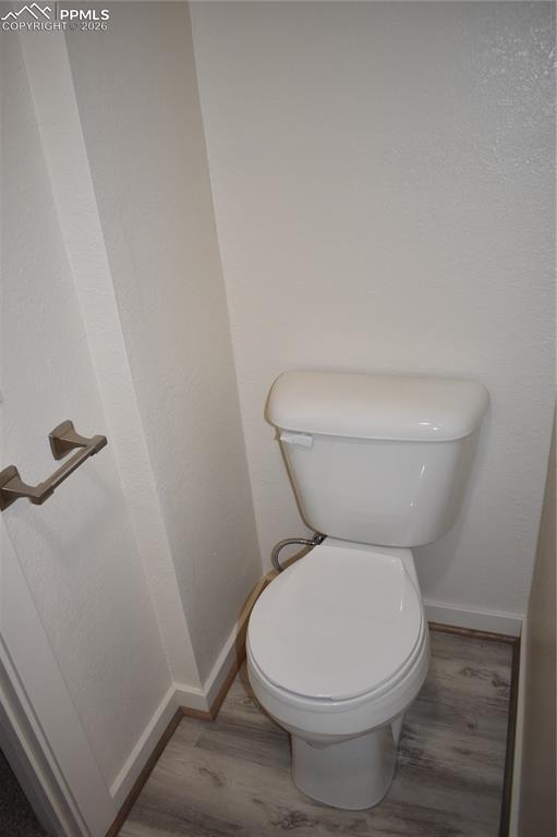 805 Raton Avenue La Junta, CO 81050 - Photo 16 of 26 a white toilet sitting next to a sink