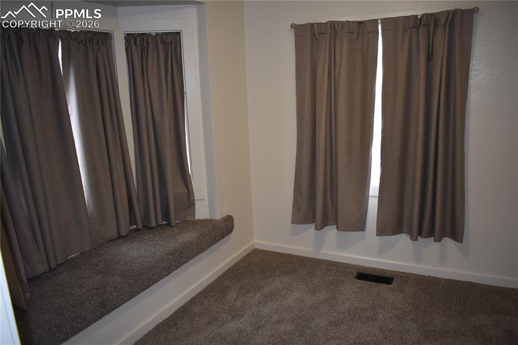 805 Raton Avenue La Junta, CO 81050 - Photo 17 of 26 a view of a hardwood floor