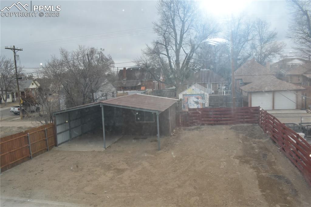 805 Raton Avenue La Junta, CO 81050 - Photo 18 of 26 a view of a terrace with trees