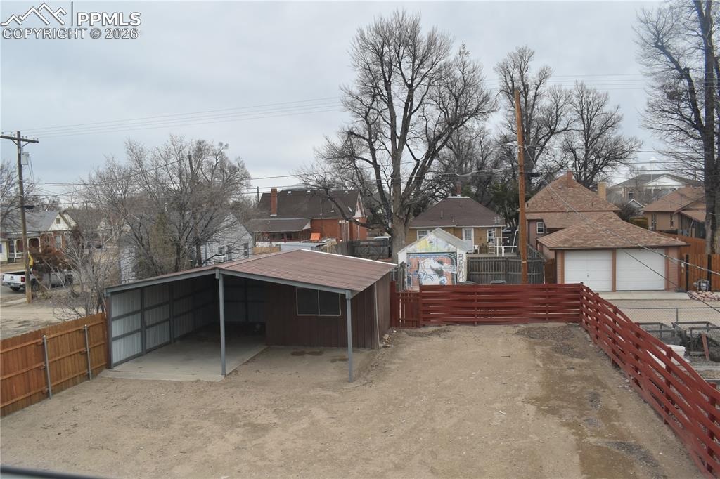 805 Raton Avenue La Junta, CO 81050 - Photo 19 of 26 a view of a dinning table and chairs in the patio