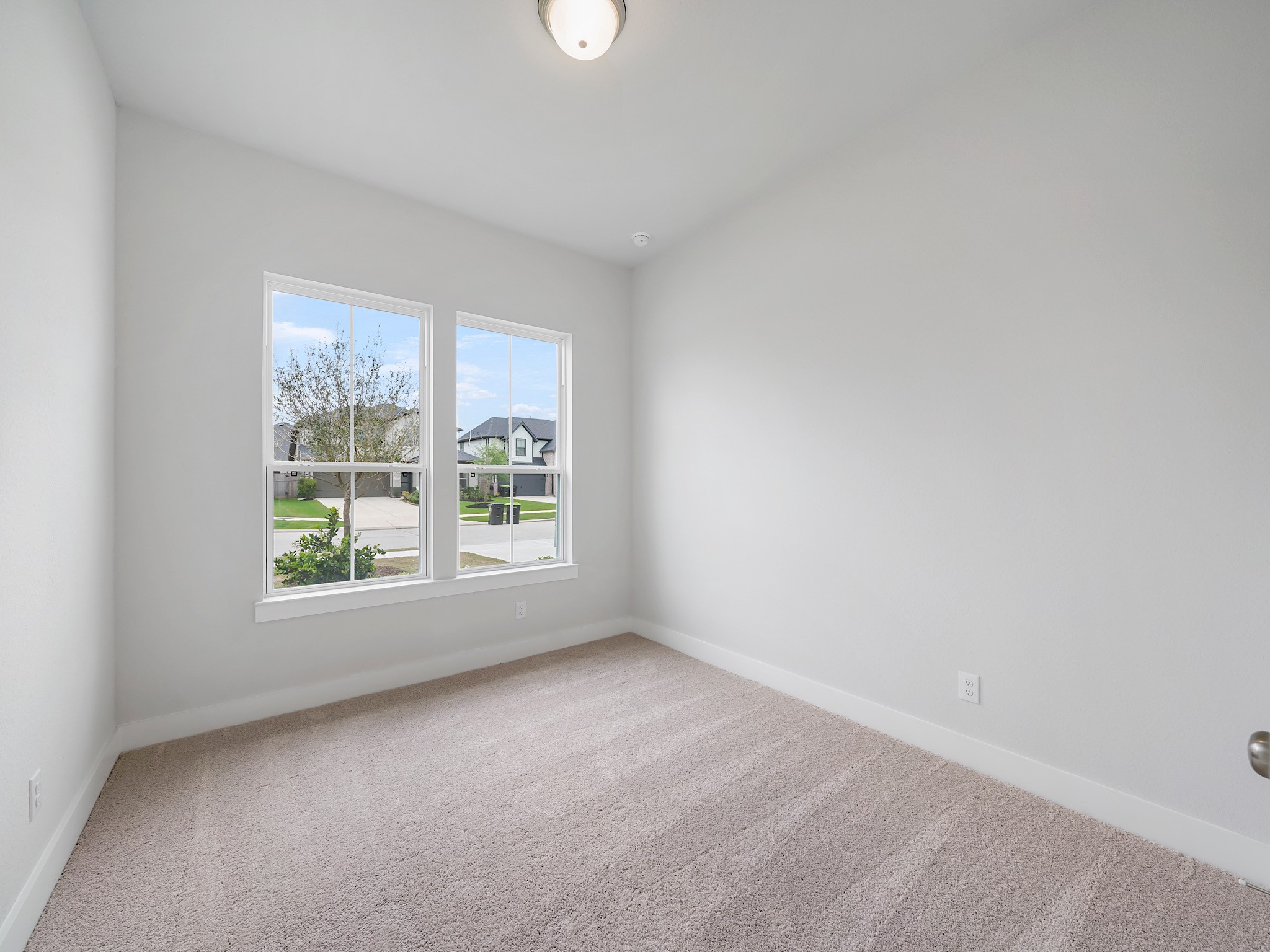 6010 Rolling Strm Court Fulshear, TX 77441 - Photo 13 of 23 Discover flexibility with this versatile secondary bedroom conveniently located on the first floor.