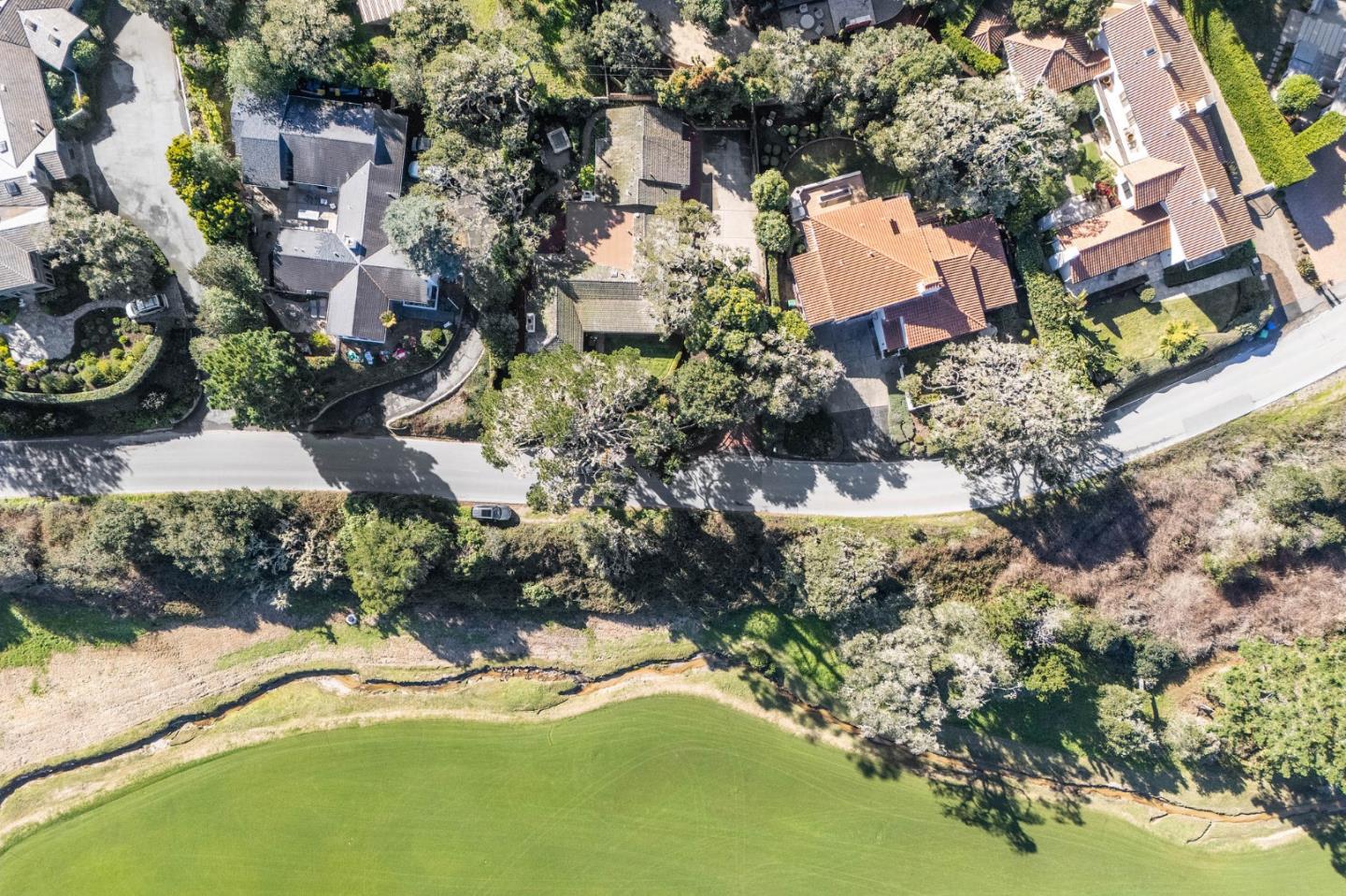 2933 Old 17 Mile Drive Pebble Beach, CA 93953 - Photo 12 of 19 an aerial view of residential house with outdoor space and trees all around