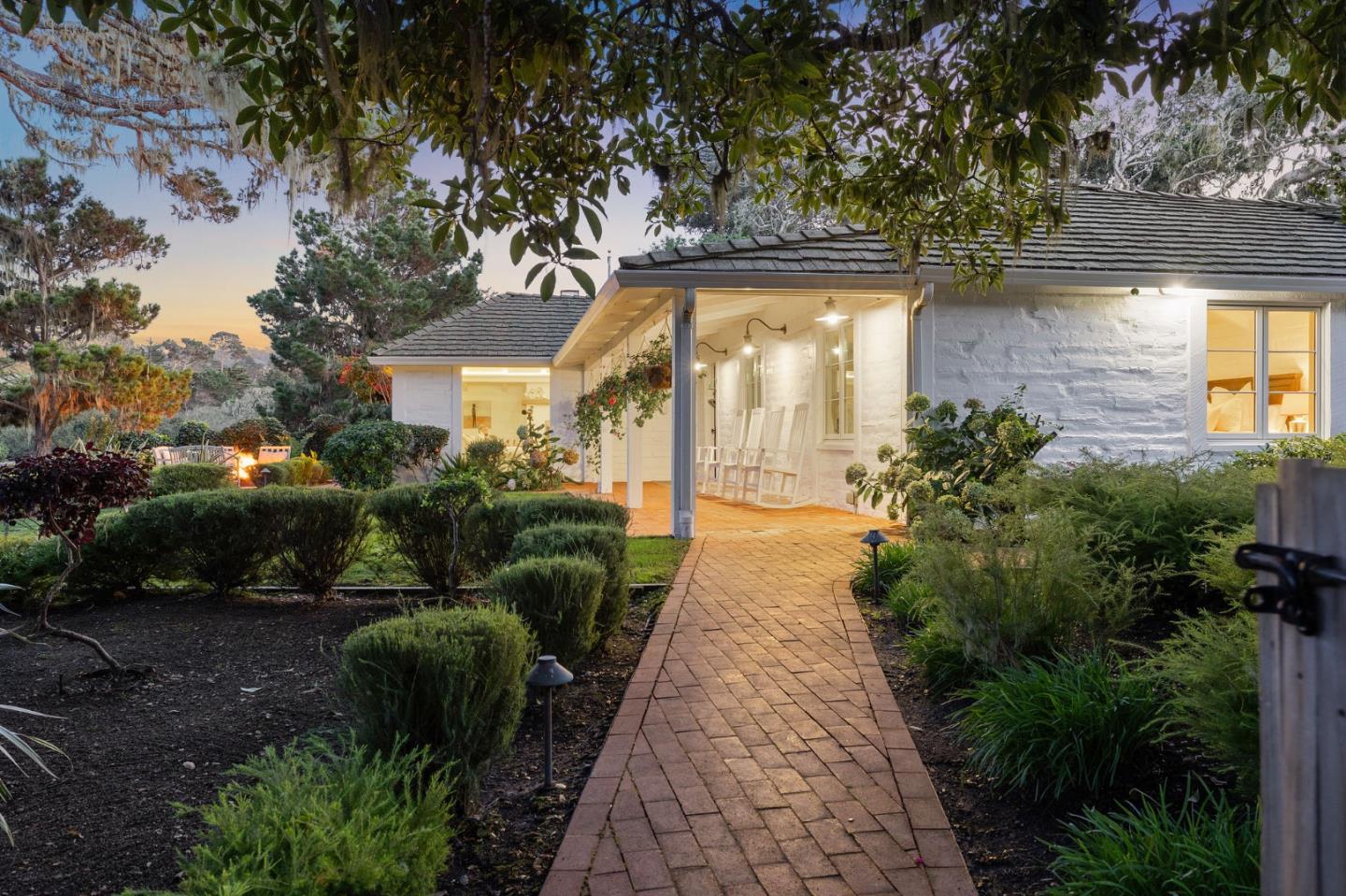 2933 Old 17 Mile Drive Pebble Beach, CA 93953 - Photo 18 of 19 a view of a house with backyard and garden