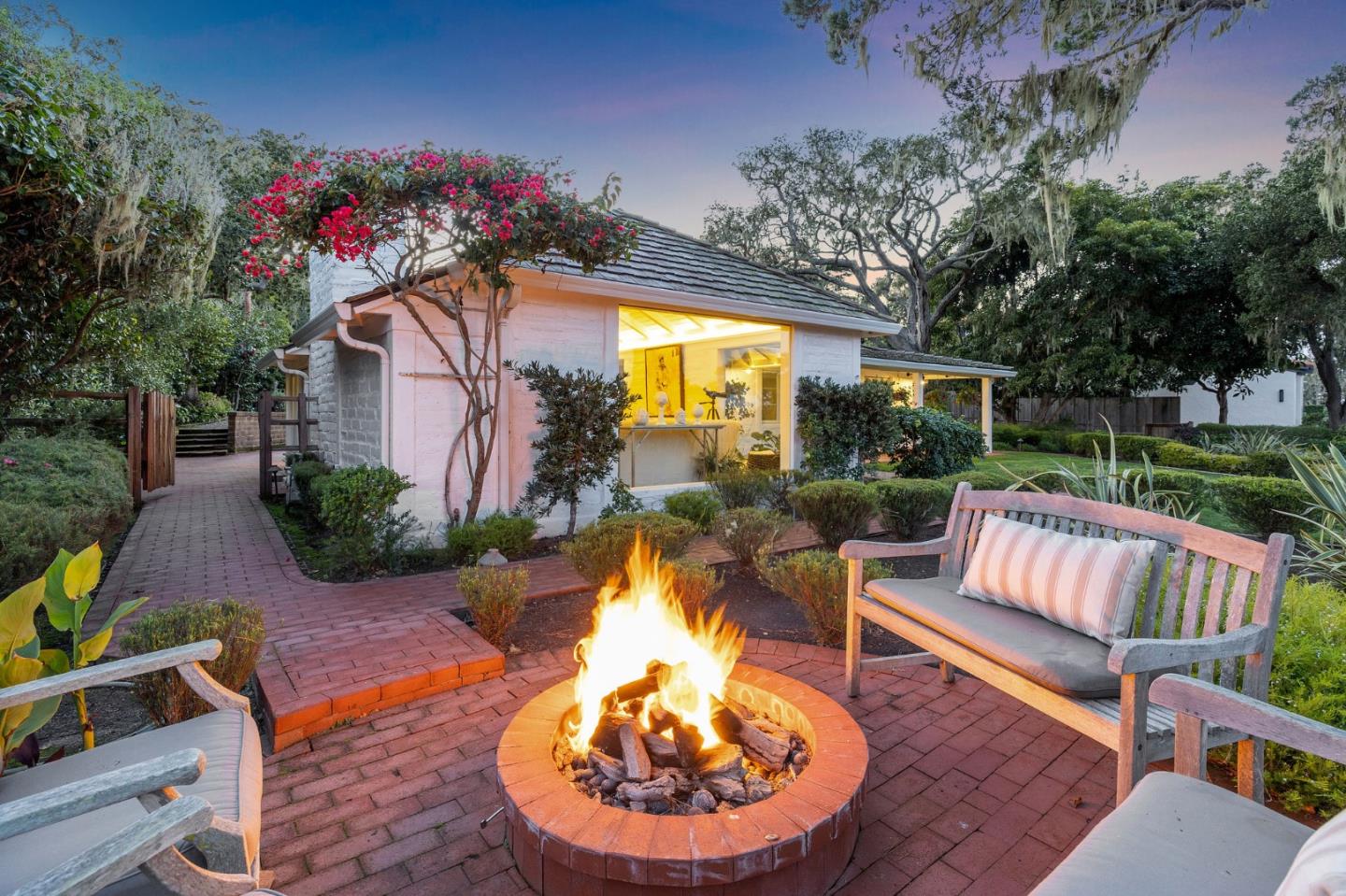 2933 Old 17 Mile Drive Pebble Beach, CA 93953 - Photo 19 of 19 a view of a patio with couches table and chairs and potted plants