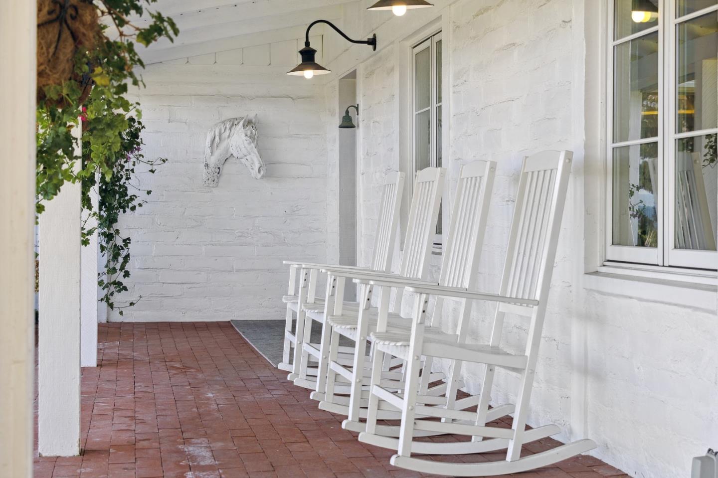 2933 Old 17 Mile Drive Pebble Beach, CA 93953 - Photo 4 of 19 a view of wooden stair with a potted plant