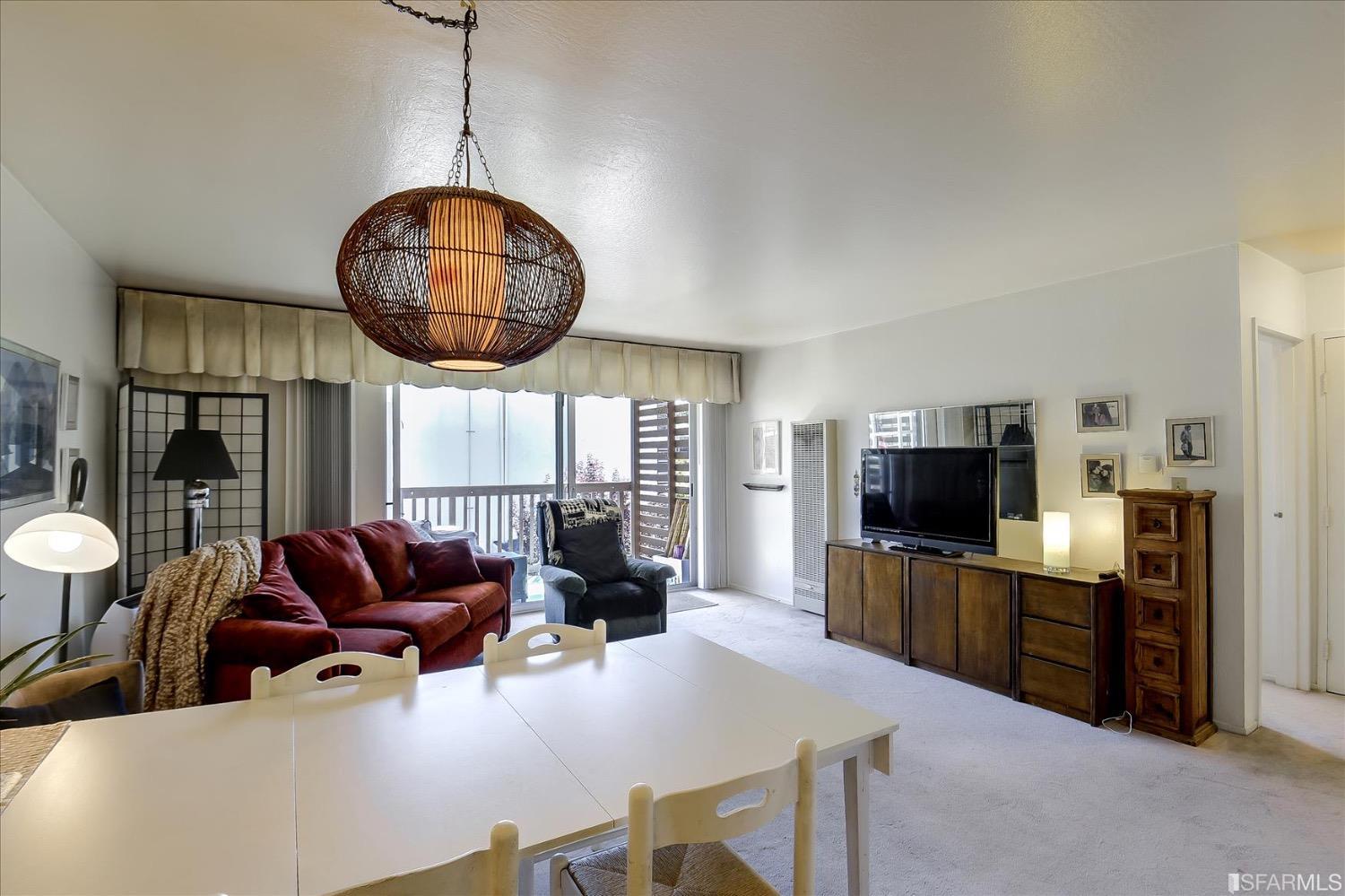 50 Inca Lane, Unit 5 San Francisco, CA 94115 - Photo 11 of 33 a living room with furniture and a flat screen tv