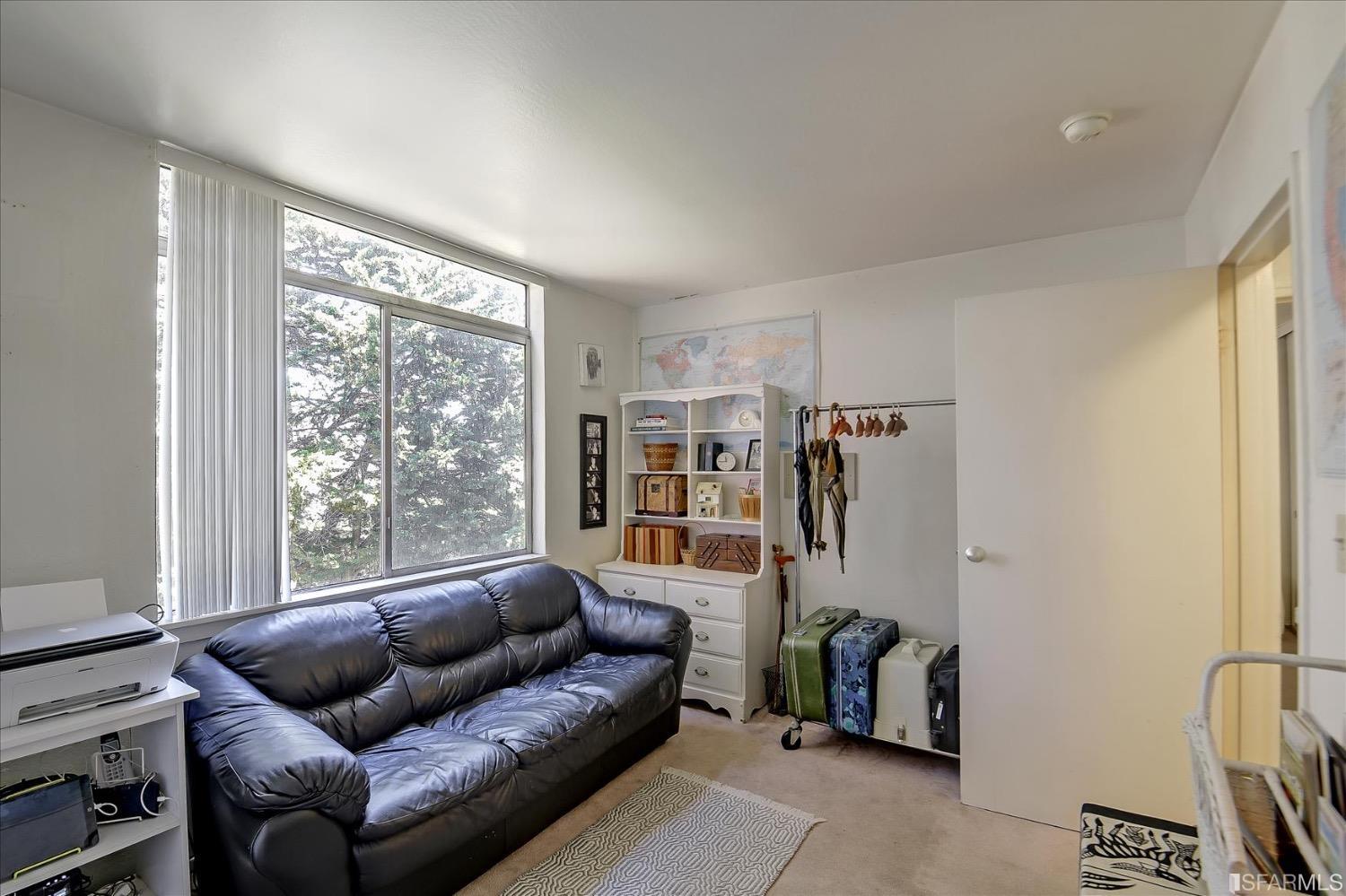 50 Inca Lane, Unit 5 San Francisco, CA 94115 - Photo 16 of 33 a living room with furniture and a window