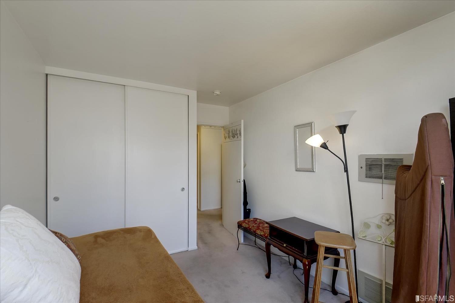 50 Inca Lane, Unit 5 San Francisco, CA 94115 - Photo 21 of 33 a bedroom with a bed and a dresser in it